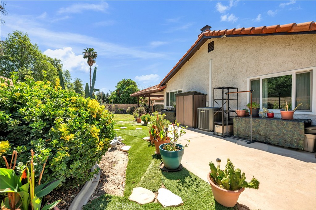 1114 Bottle Tree Way Hemet, CA 92545 - Photo 25 of 25 a front view of a house with a yard
