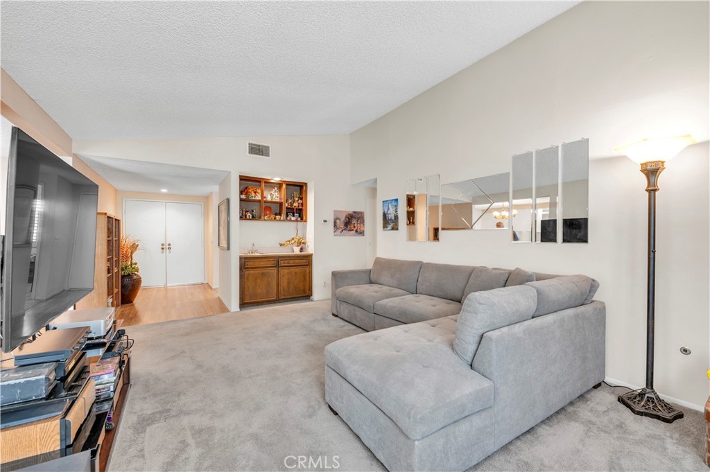 1114 Bottle Tree Way Hemet, CA 92545 - Photo 10 of 25 a living room with furniture and a flat screen tv