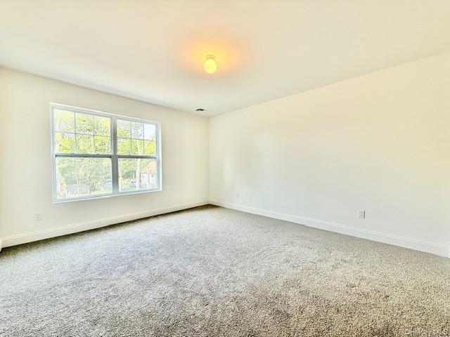 120 River Road Shirley, NY 11967 - Photo 17 of 27 an empty room with windows