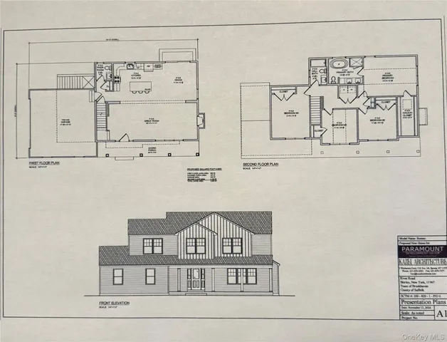 a view of a wall with white cabinet