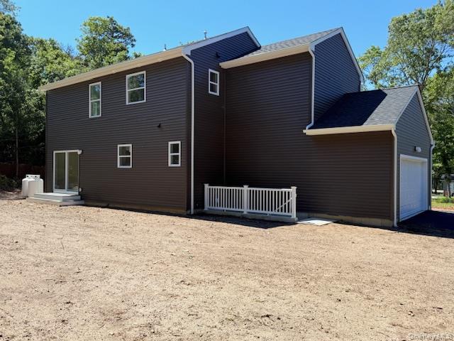120 River Road Shirley, NY 11967 - Photo 6 of 27 a front view of a house with a yard
