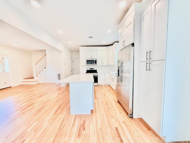 120 River Road Shirley, NY 11967 - Photo 10 of 27 a view of kitchen with wooden floor