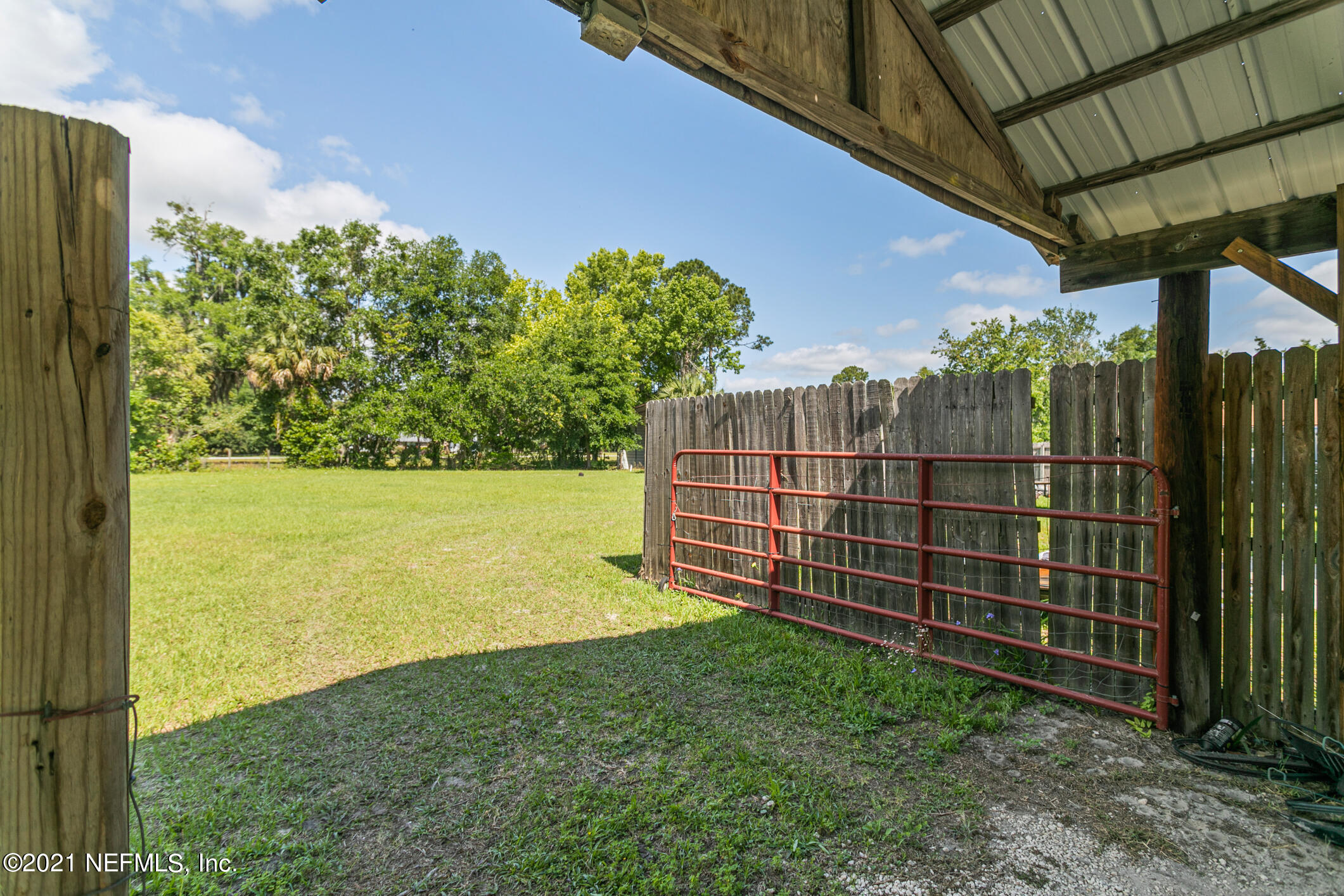 1012 South Moody Road Palatka, FL 32177 - Photo 22 of 26 Backyard Entrance