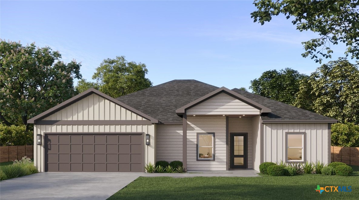 a view of a white house next to a yard with big trees