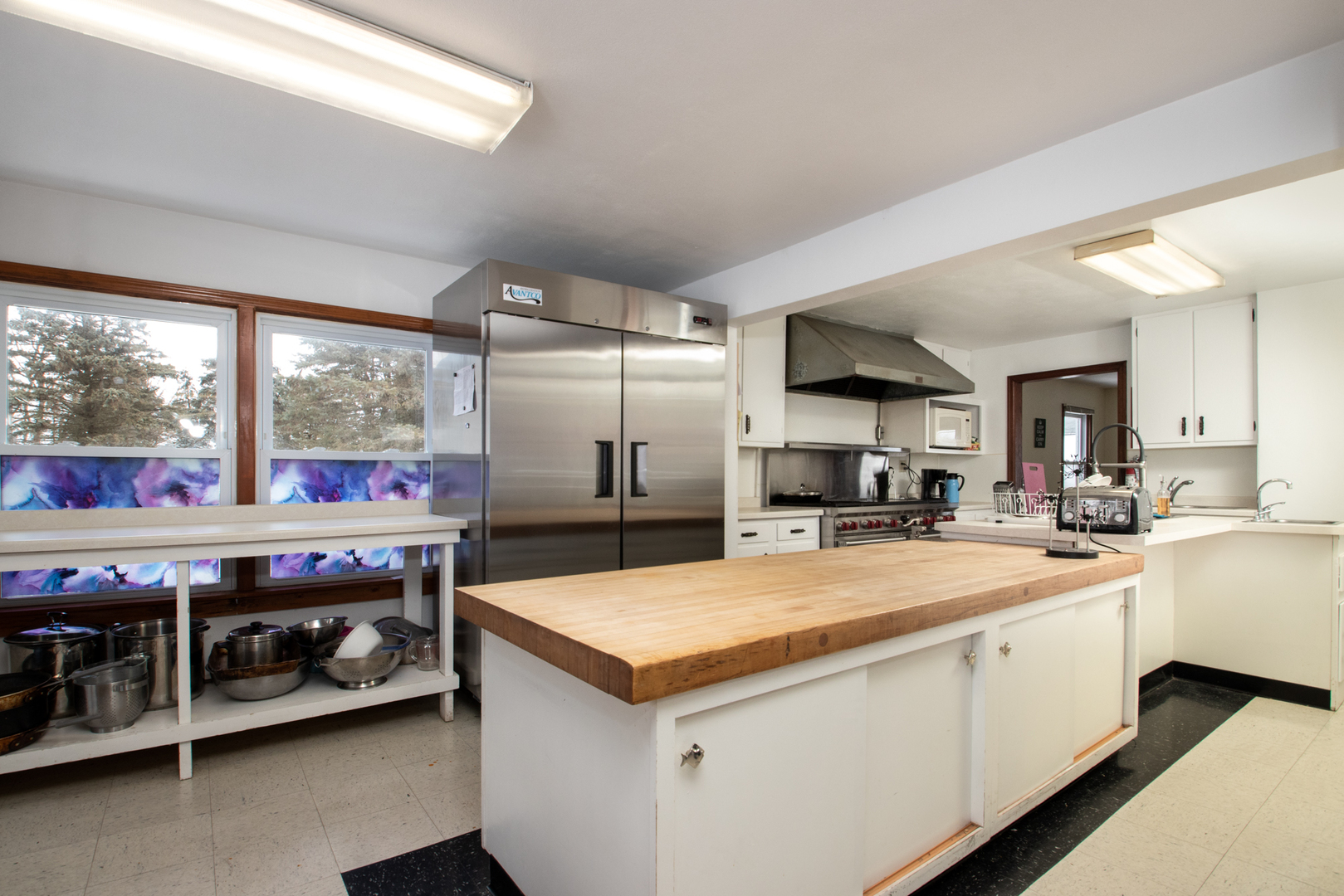2567 Osborne Road Winnebago, IL 61088 - Photo 5 of 43 a kitchen with stainless steel appliances a sink and a stove