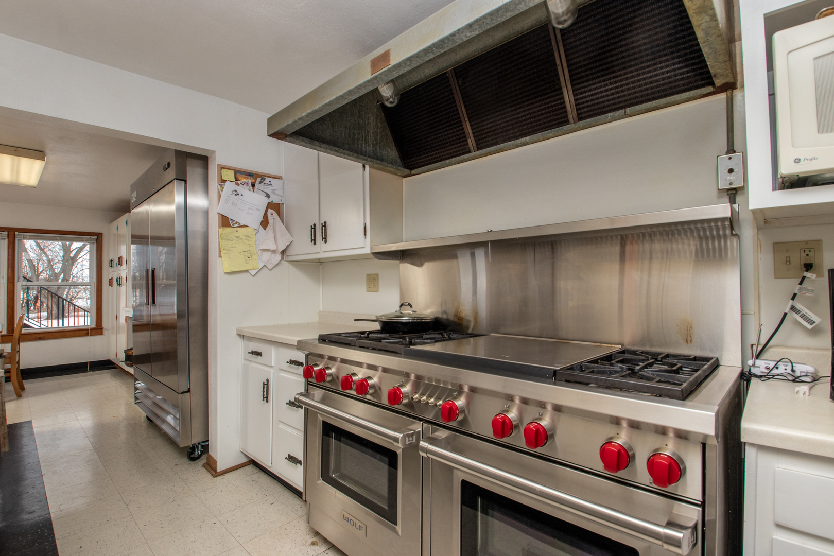 2567 Osborne Road Winnebago, IL 61088 - Photo 10 of 43 a kitchen with stove and cabinets