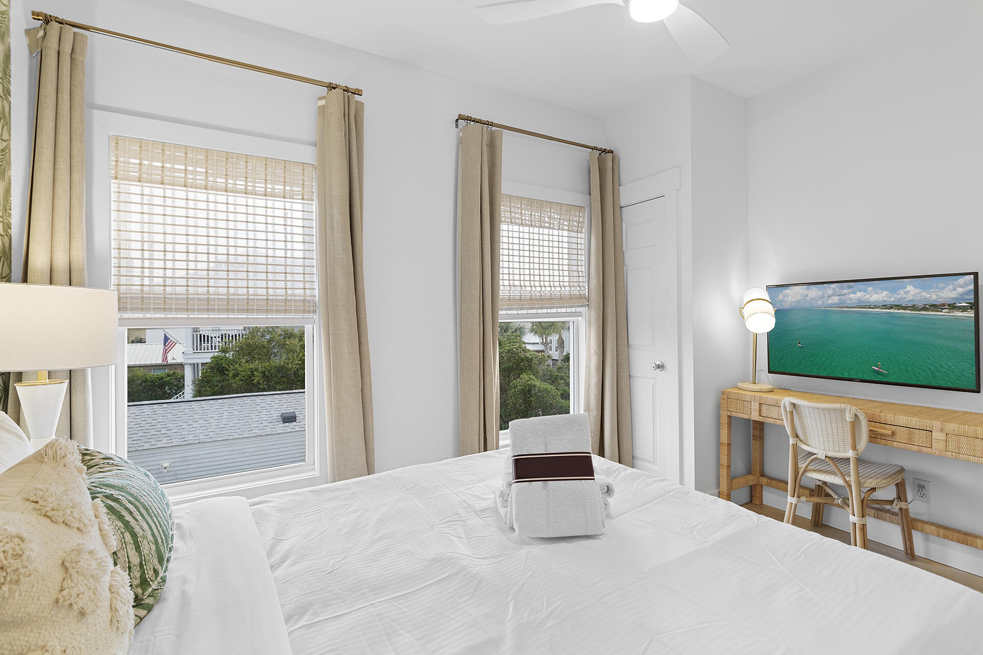 53 Gulfside Way Miramar Beach, FL 32550 - Photo 15 of 34 a bedroom with a bed and a flat screen tv