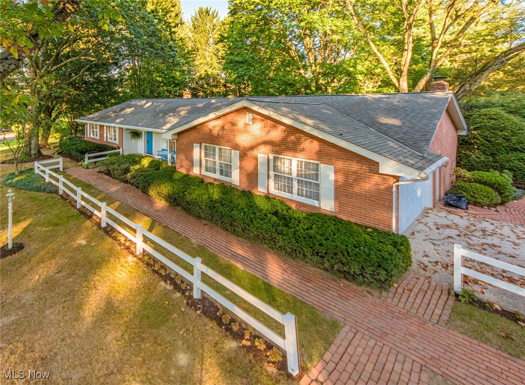 1107 Tanager Road Akron, OH 44333 - Photo 1 of 43 3-bedroom ranch on 1.21 acres. Brick walkway to the front of the home.