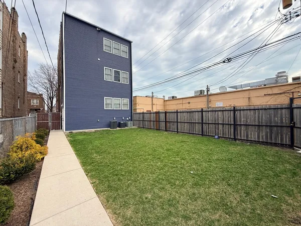 a view of a backyard with a building