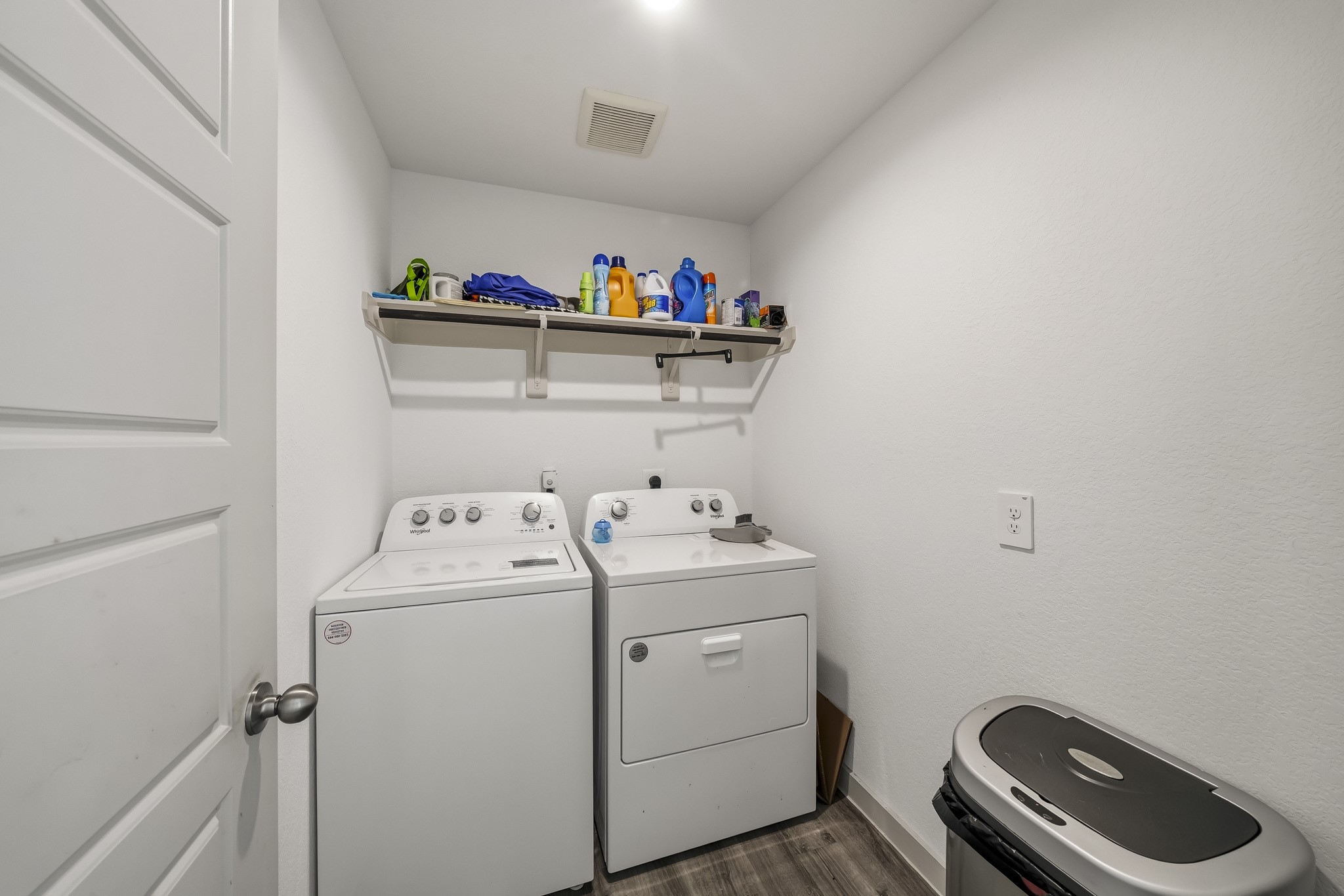 919 Tall Shire Court Rosharon, TX 77583 - Photo 16 of 19 A dedicated laundry space designed for efficiency, complete with side-by-side appliance capacity. The functional footprint maximizes wall space while providing continuous flooring from adjacent common areas.
