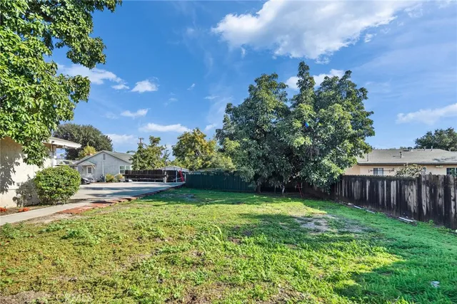 a view of a backyard with a garden