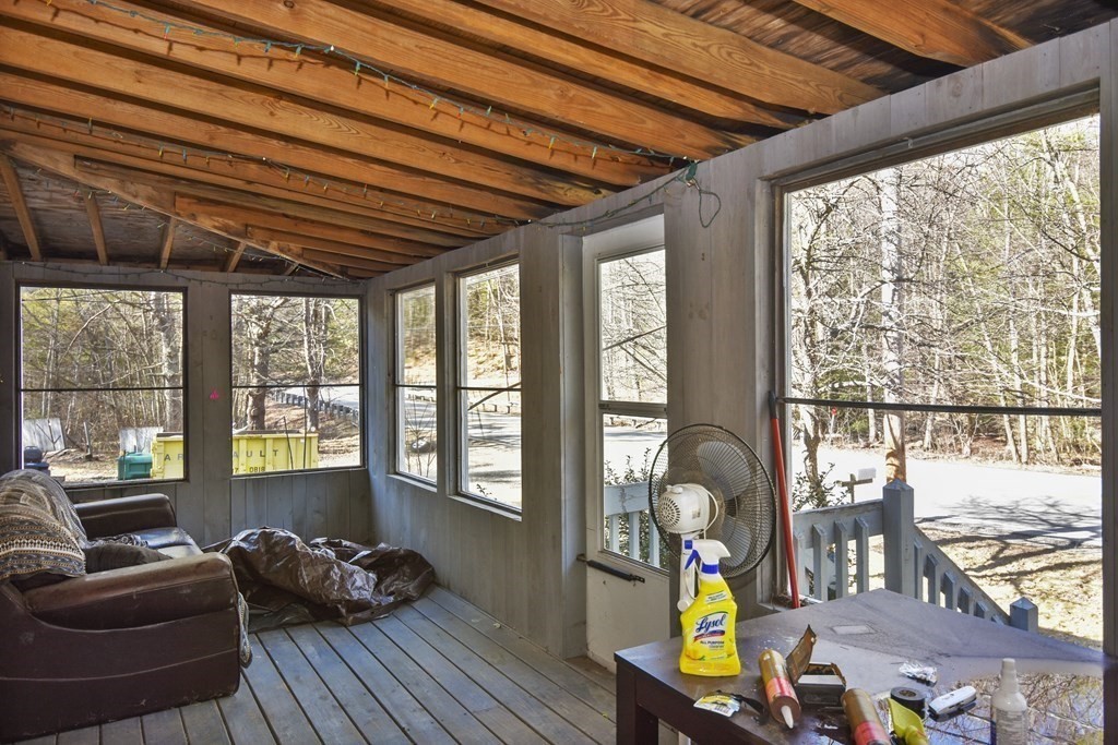 96 Ashby Road Ashburnham, MA 01430 - Photo 5 of 30 a living room filled with furniture and furniture