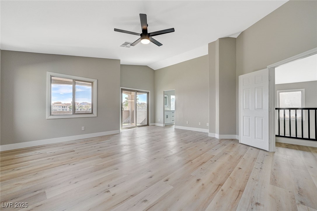 153 Tall Ruff Drive Las Vegas, NV 89148 - Photo 20 of 59 Empty room with a ceiling fan, baseboards, light w