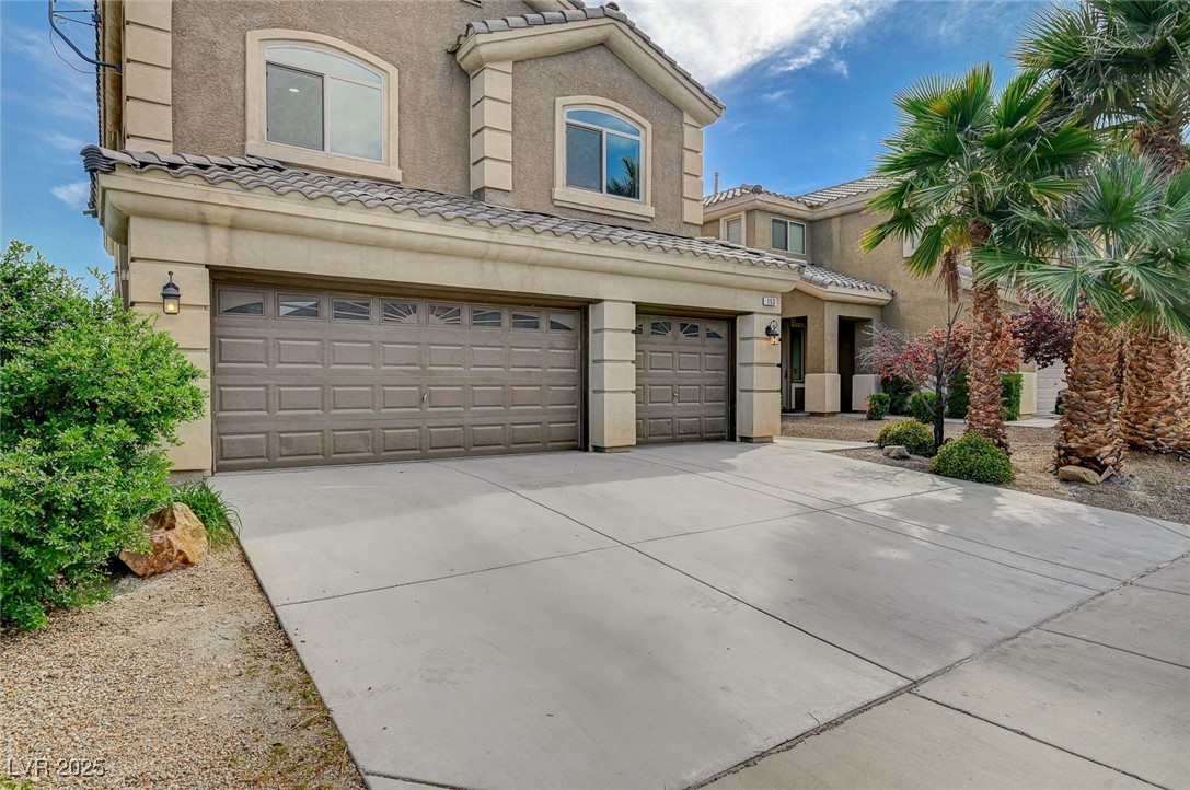 153 Tall Ruff Drive Las Vegas, NV 89148 - Photo 2 of 59 Townhome / multi-family property with a tiled roof