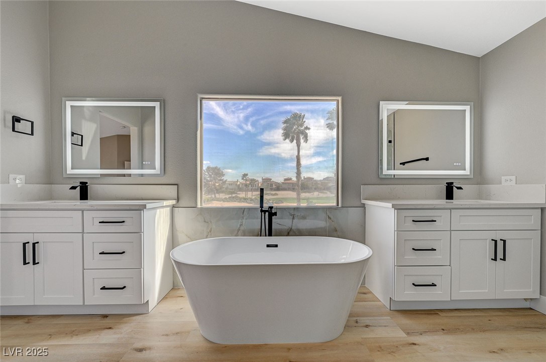 153 Tall Ruff Drive Las Vegas, NV 89148 - Photo 22 of 59 Full bathroom with two vanities, lofted ceiling, a