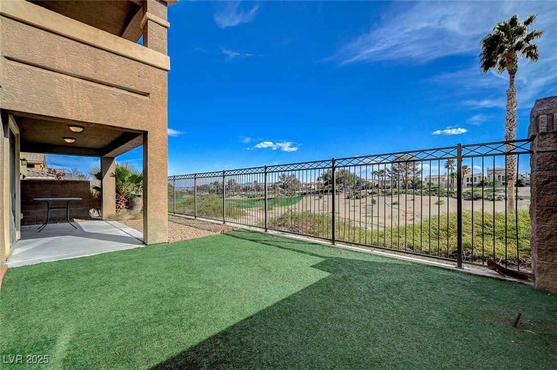 153 Tall Ruff Drive Las Vegas, NV 89148 - Photo 30 of 59 View of yard featuring a patio and fence