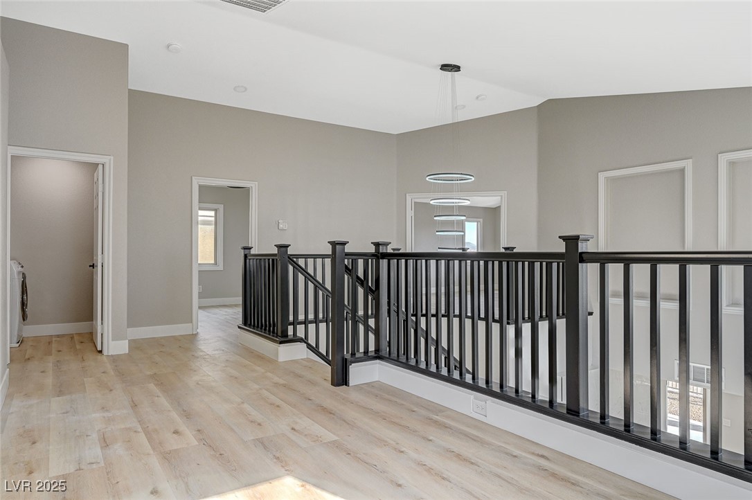 153 Tall Ruff Drive Las Vegas, NV 89148 - Photo 46 of 59 Corridor featuring an upstairs landing, visible ve