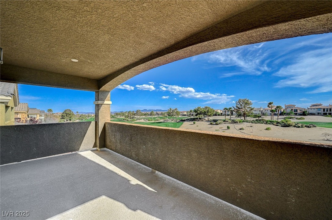 153 Tall Ruff Drive Las Vegas, NV 89148 - Photo 47 of 59 View of patio featuring a balcony and a residentia