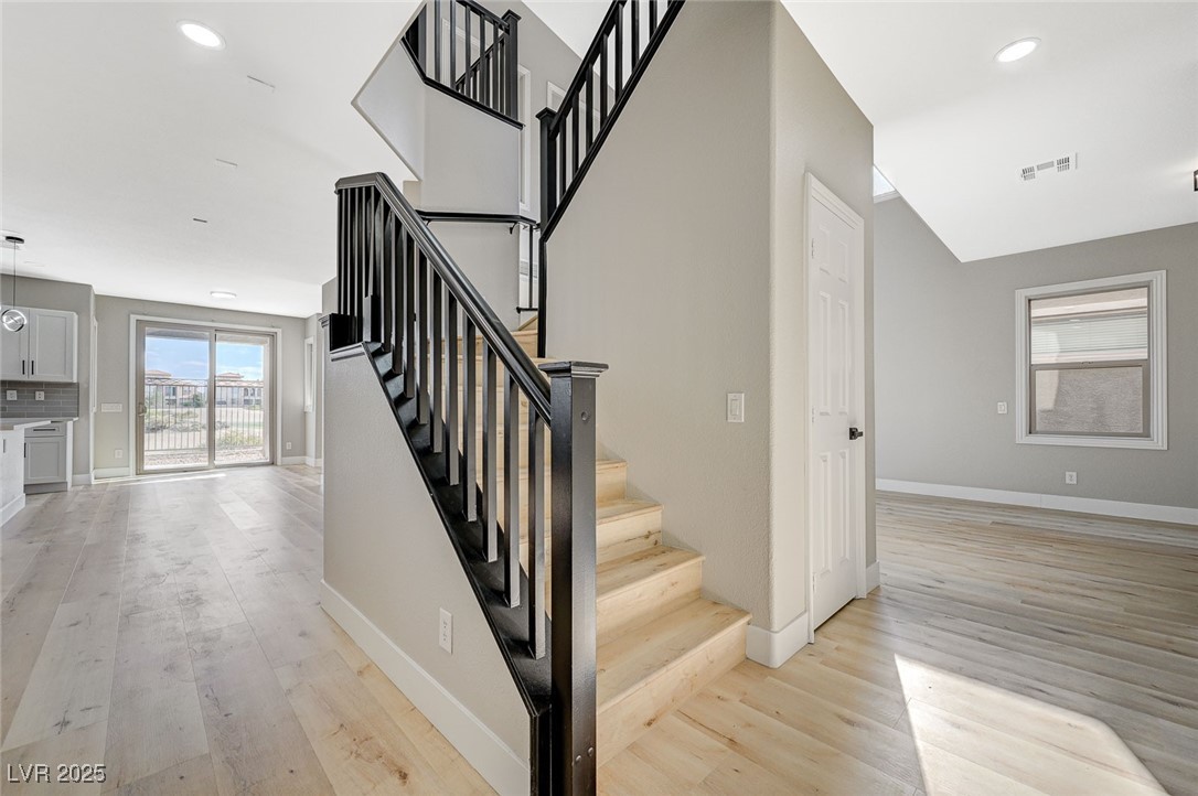 153 Tall Ruff Drive Las Vegas, NV 89148 - Photo 51 of 59 Stairway with recessed lighting, baseboards, and w