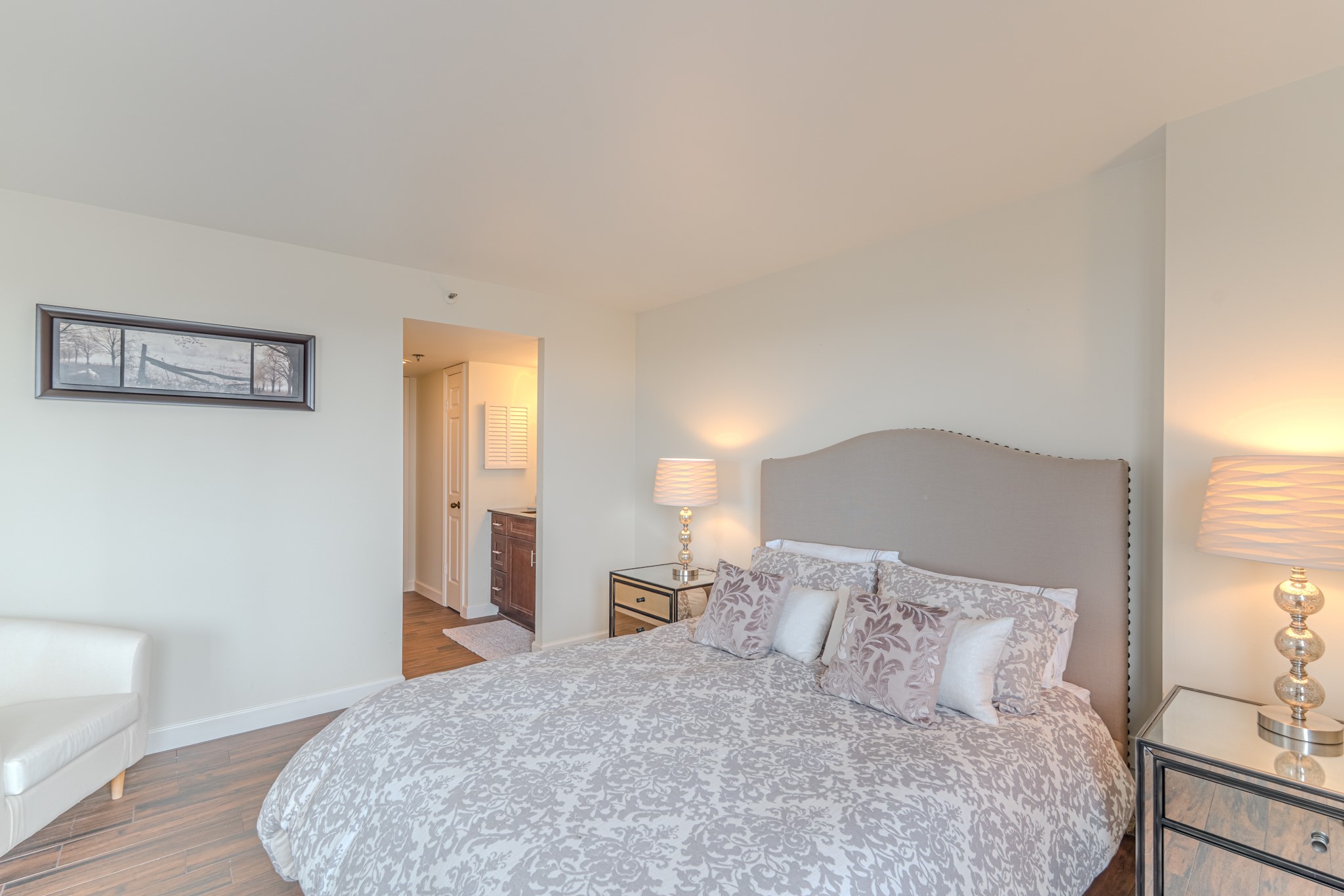 3525 Sage Road, Unit 1016 Houston, TX 77056 - Photo 34 of 42 a large bed in a white room