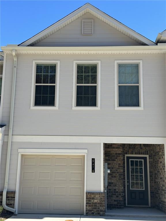6174 Ripple Way, Unit 81 South Fulton, GA 30349 - Photo 1 of 1 a front view of a house