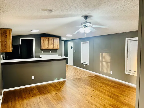 a view of livingroom with kitchen