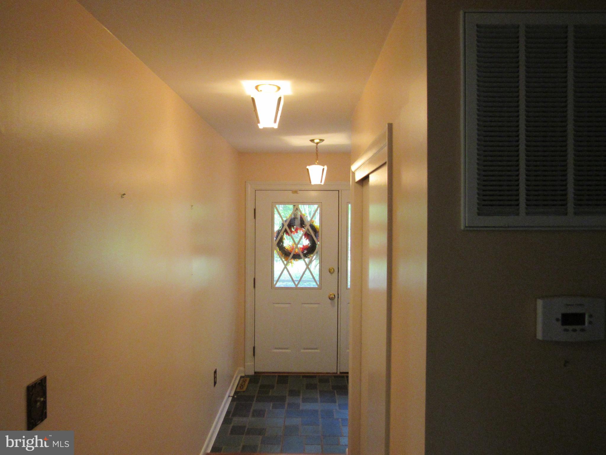 12553 Calyx Road Lusby, MD 20657 - Photo 18 of 61 Hall view looking to front door