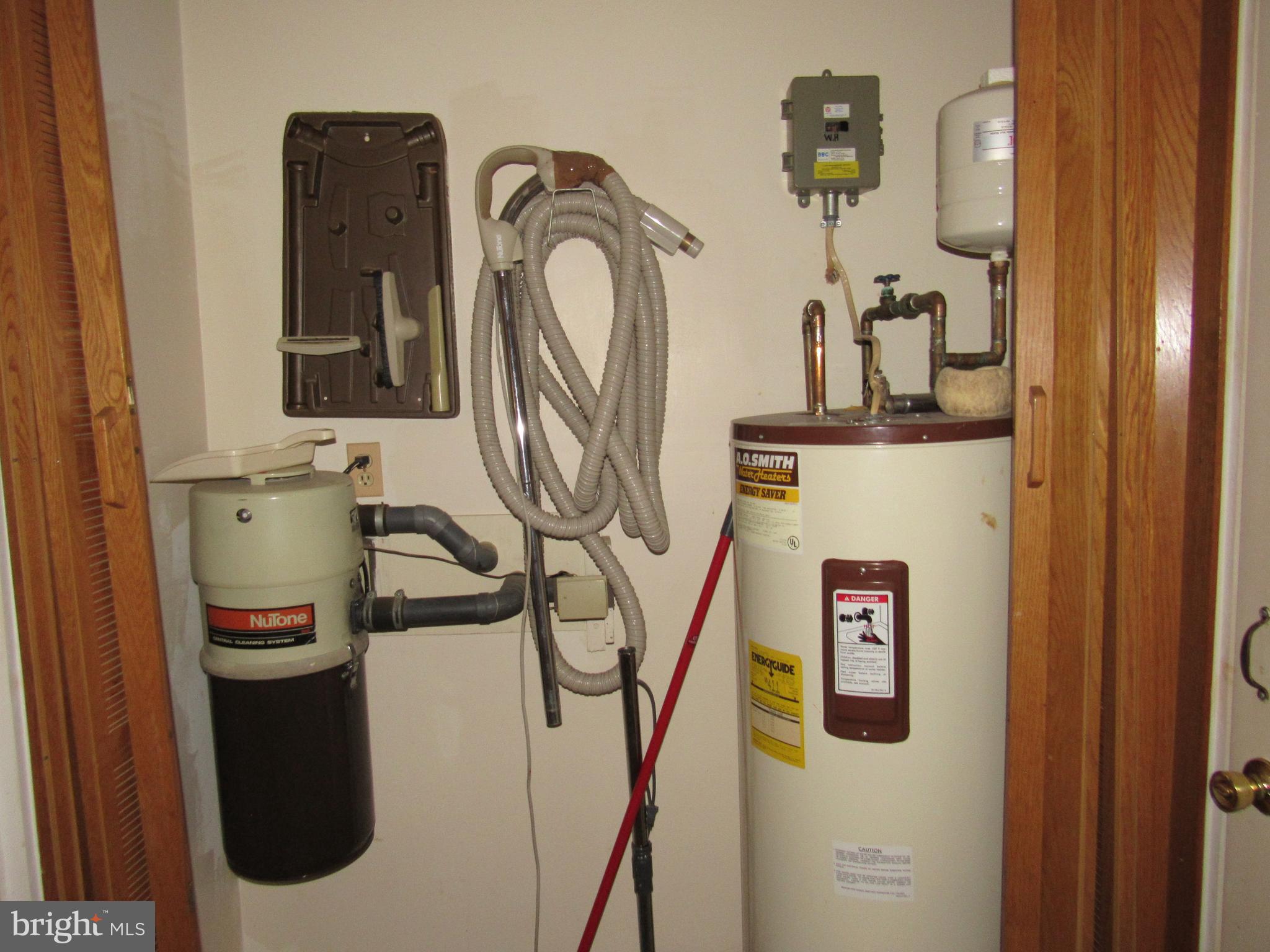 12553 Calyx Road Lusby, MD 20657 - Photo 40 of 61 Central vacuum and hot water area