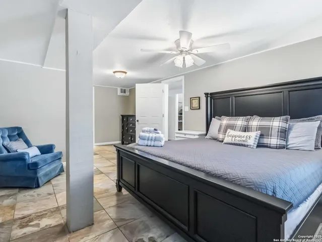 a view of living room with furniture and window