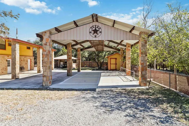 a outdoor space with lots of palm trees