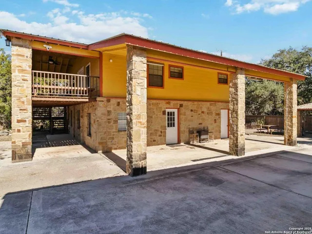 a house with trees in the background