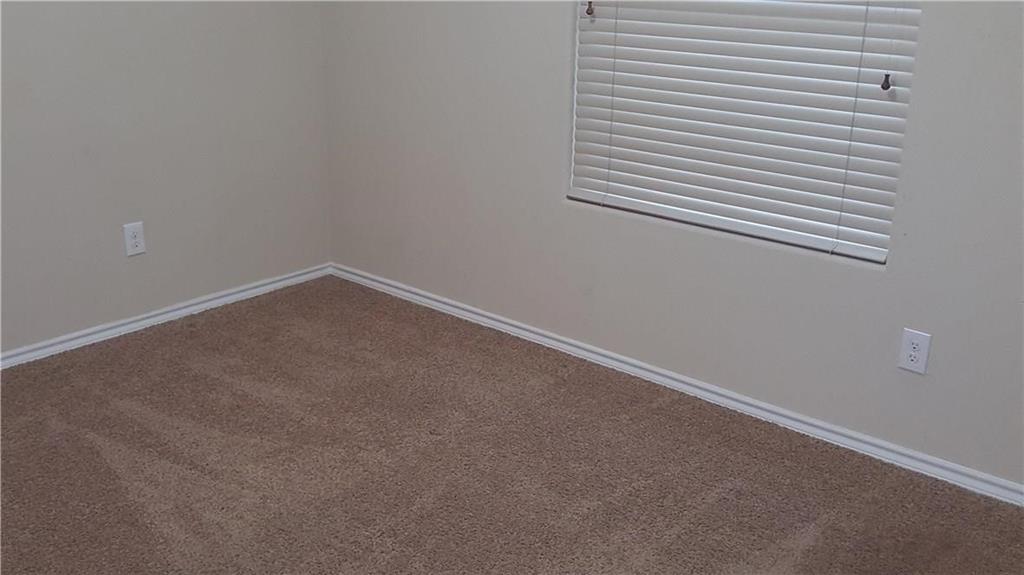 8217 Spotted Doe Drive Fort Worth, TX 76179 - Photo 17 of 22 an empty room with a window
