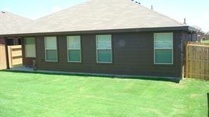 8217 Spotted Doe Drive Fort Worth, TX 76179 - Photo 21 of 22 a backyard of a house