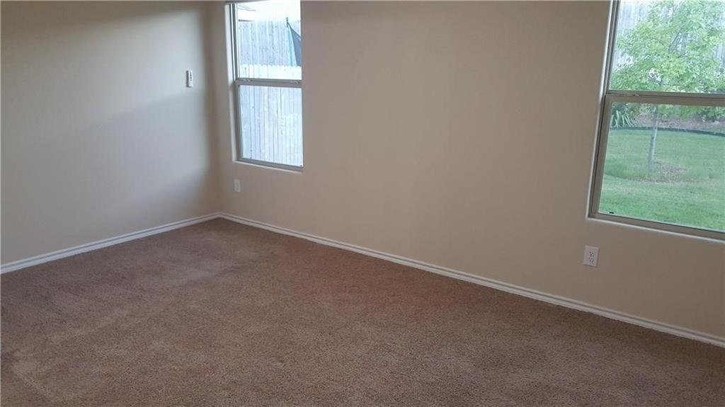 8217 Spotted Doe Drive Fort Worth, TX 76179 - Photo 5 of 22 an empty room with a window