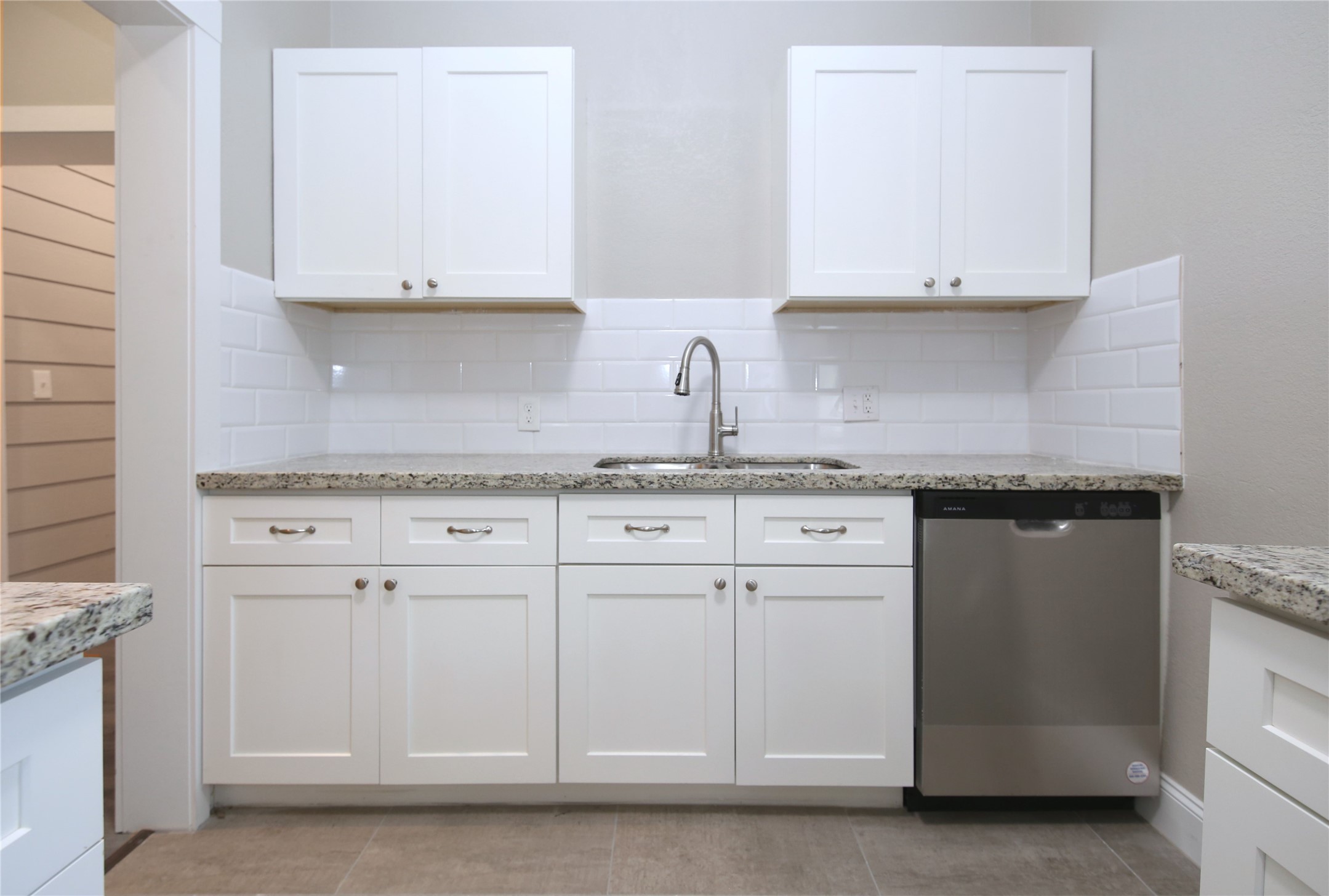 4445 Rusk Street, Unit 2 Houston, TX 77023 - Photo 15 of 21 a kitchen with white cabinets and a sink