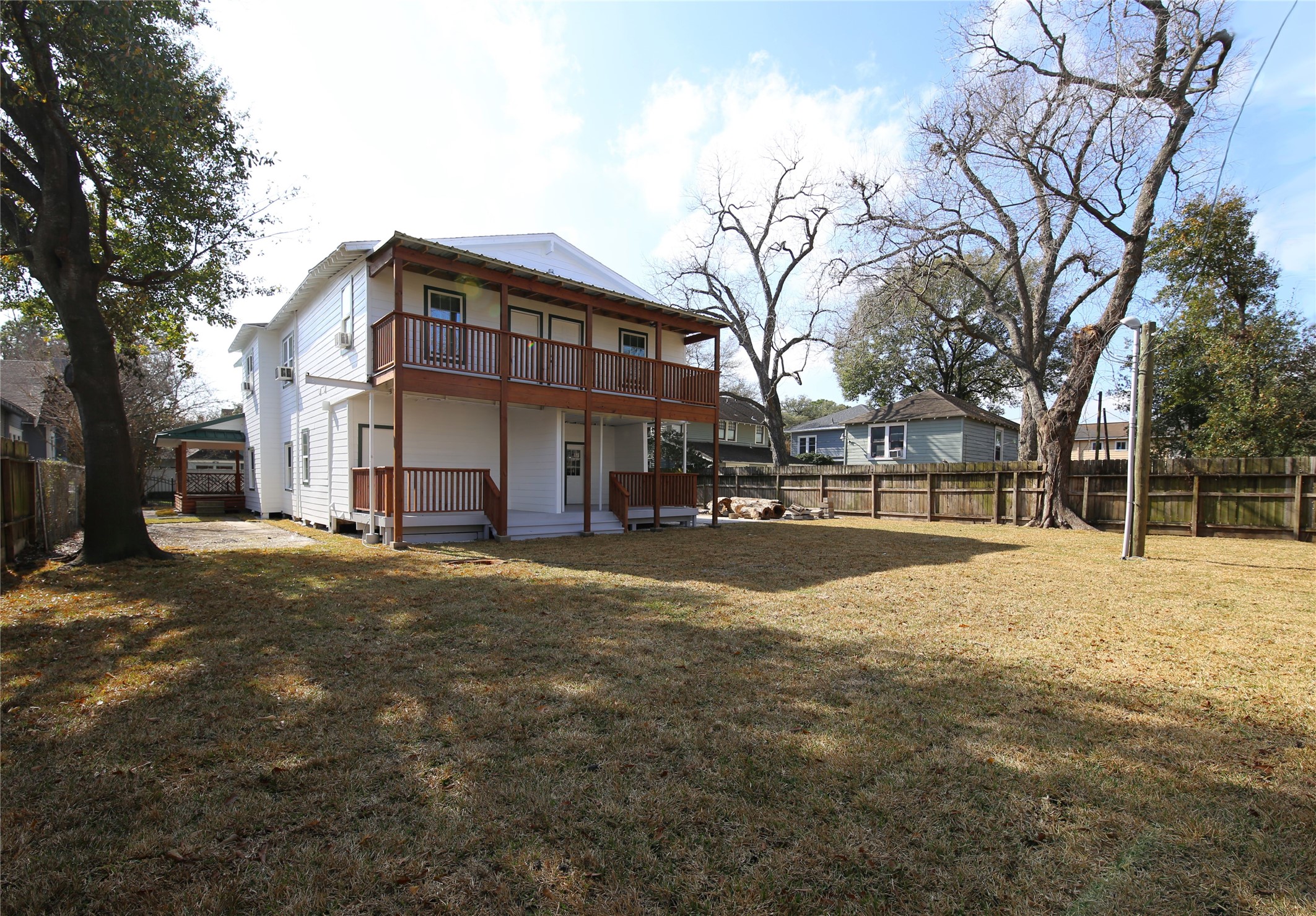 4445 Rusk Street, Unit 2 Houston, TX 77023 - Photo 21 of 21 a view of large building with snow on the road