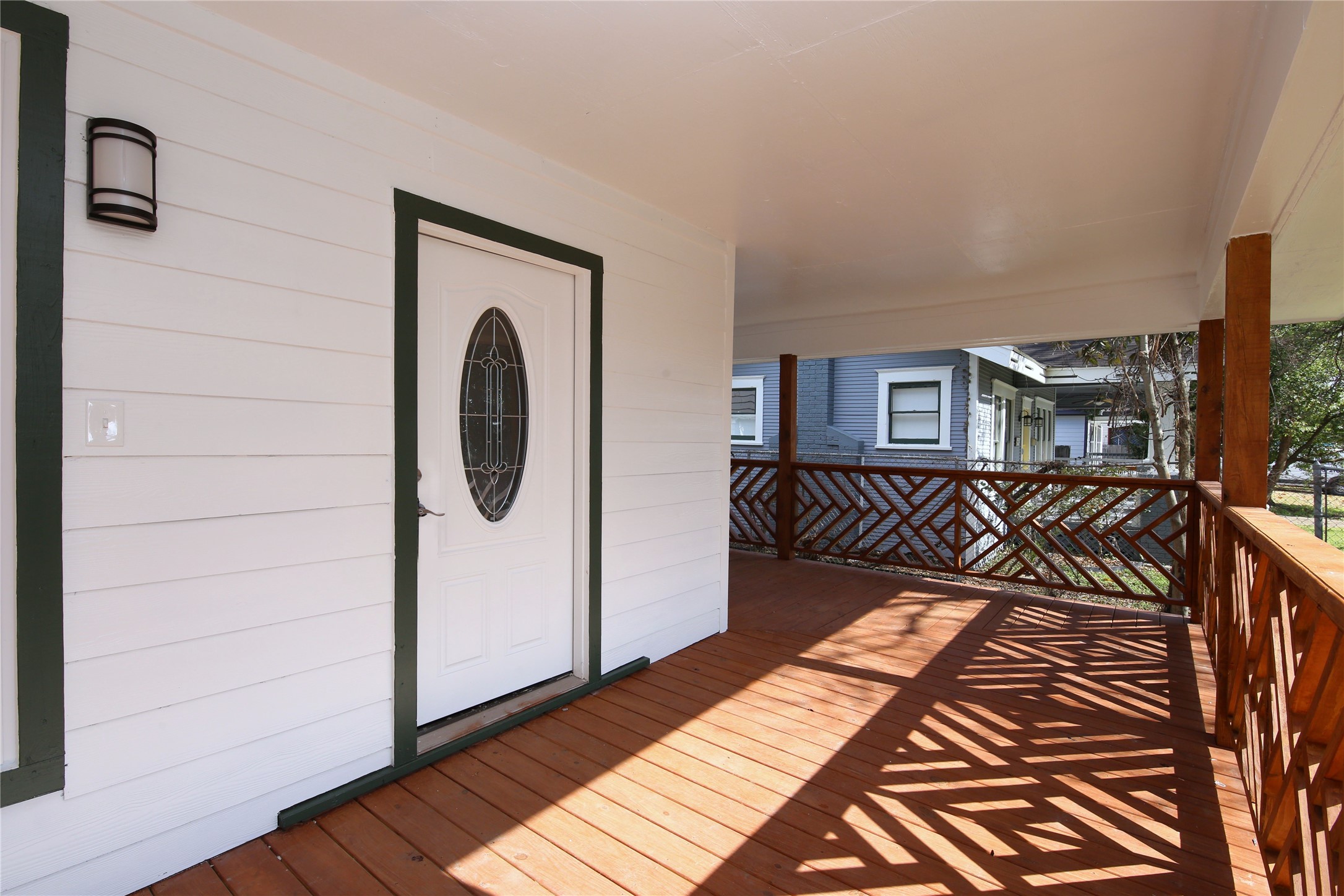 4445 Rusk Street, Unit 2 Houston, TX 77023 - Photo 5 of 21 a balcony view with a wooden floor
