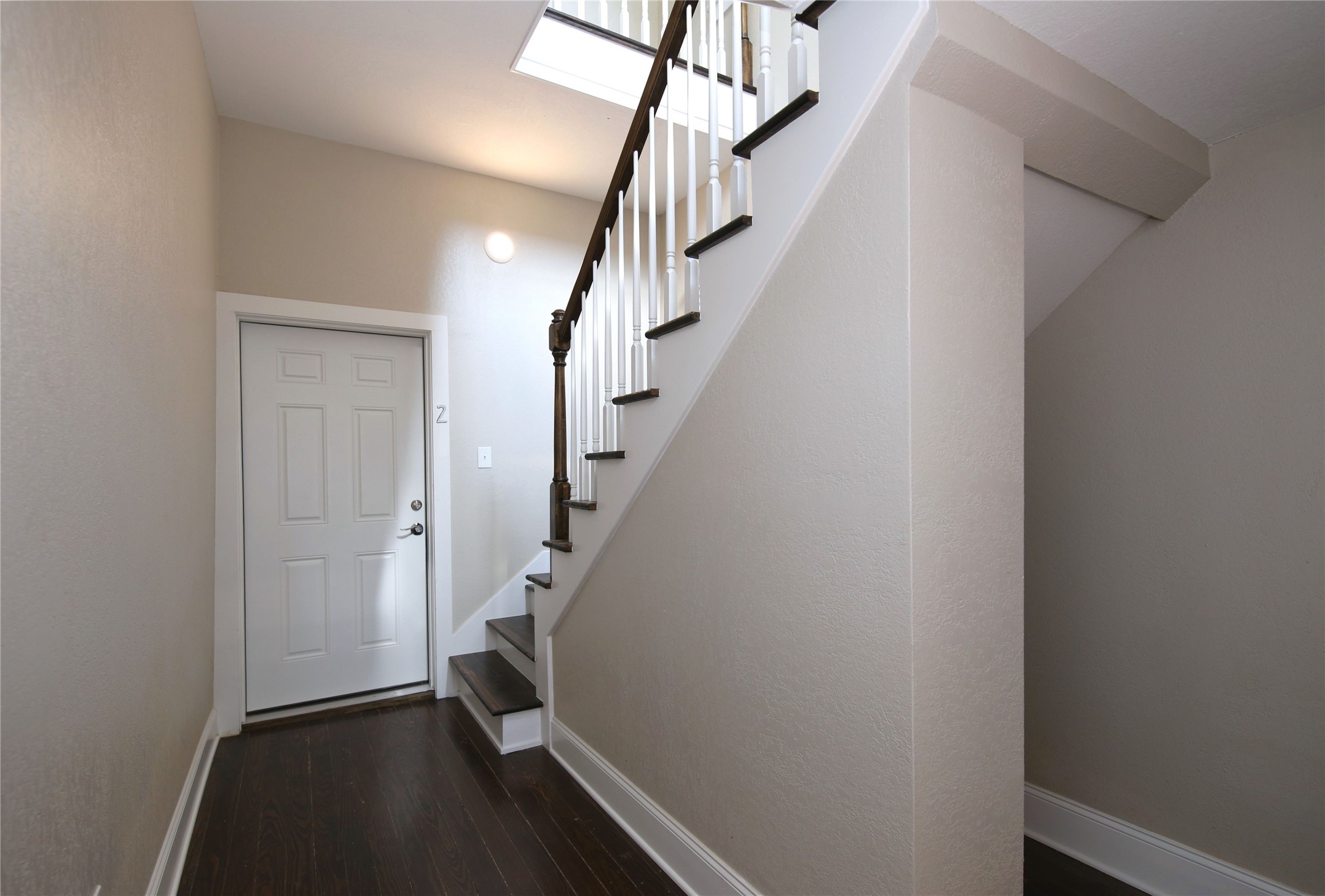 4445 Rusk Street, Unit 2 Houston, TX 77023 - Photo 6 of 21 a view of entryway with stairs