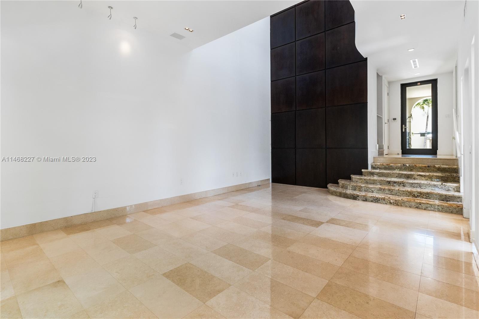 512 Fernwood Road, Unit 2 Key Biscayne, FL 33149 - Photo 14 of 23 a view of an empty room with stairs and ventilation