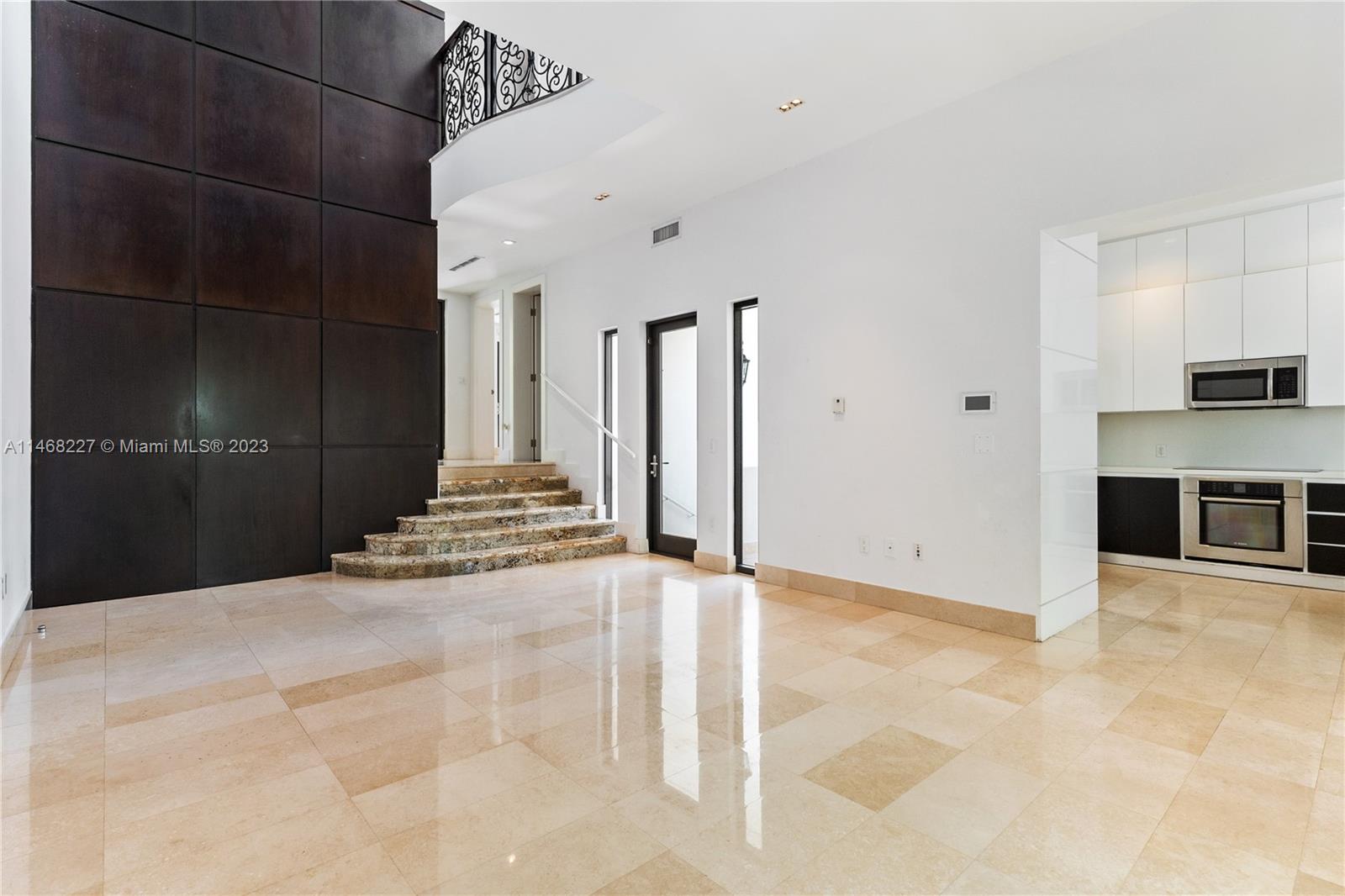 512 Fernwood Road, Unit 2 Key Biscayne, FL 33149 - Photo 15 of 23 a view of a livingroom with a staircase