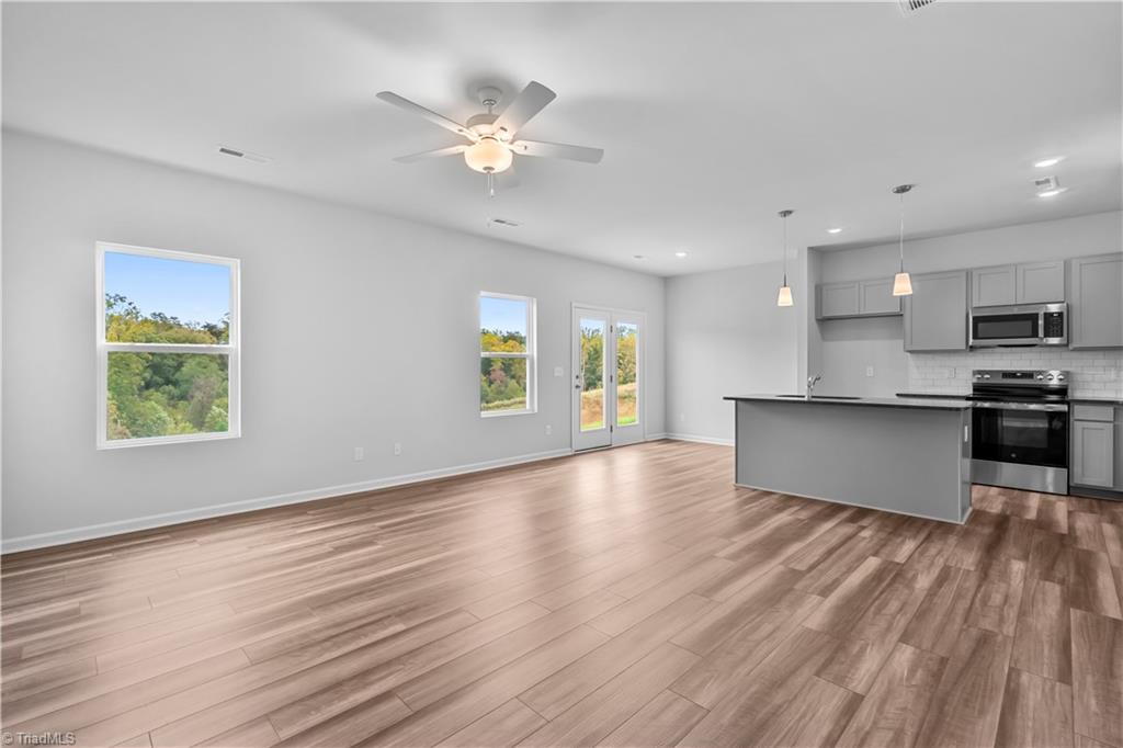 5079 Fallmeade Road Kernersville, NC 27284 - Photo 8 of 40 Great Room opens to Kitchen