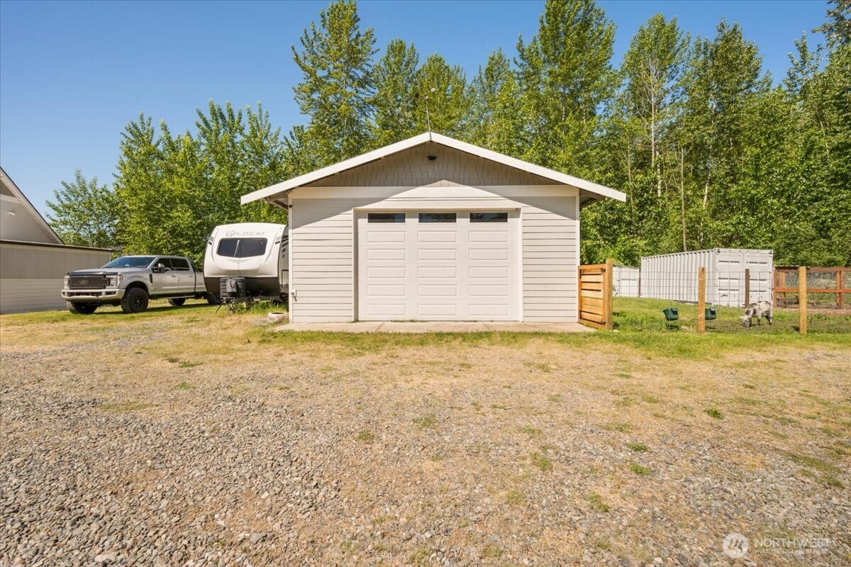 26709 Entwhistle Road East Buckley, WA 98321 - Photo 33 of 40 a view of a house with a backyard