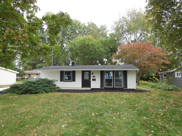front view of house with a yard