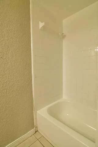 a bathroom with a bathtub