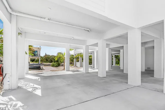 a view of livingroom with furniture and floor to ceiling window