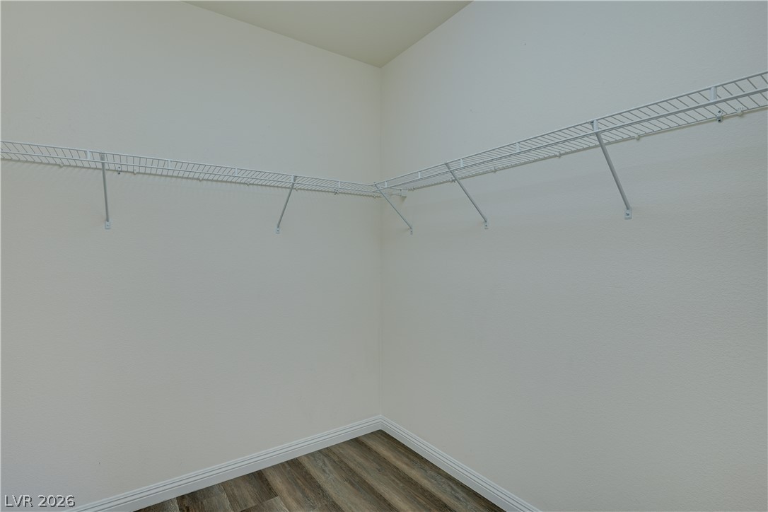 703 Principle Point Avenue Henderson, NV 89012 - Photo 21 of 29 Functional wire shelving provides ample storage capacity in this well-appointed closet space.