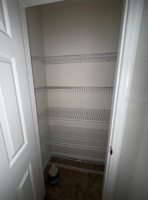 4202 Southwest 55th Circle, Unit C Ocala, FL 34474 - Photo 13 of 15 a bathroom with a window