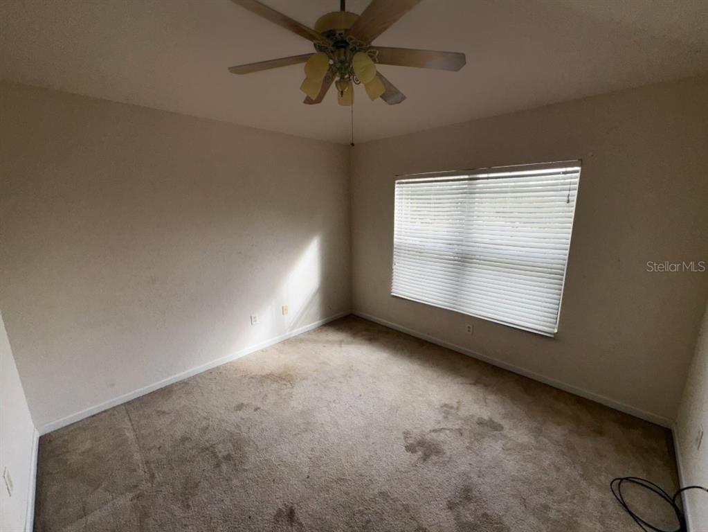 4202 Southwest 55th Circle, Unit C Ocala, FL 34474 - Photo 14 of 15 a view of room and window