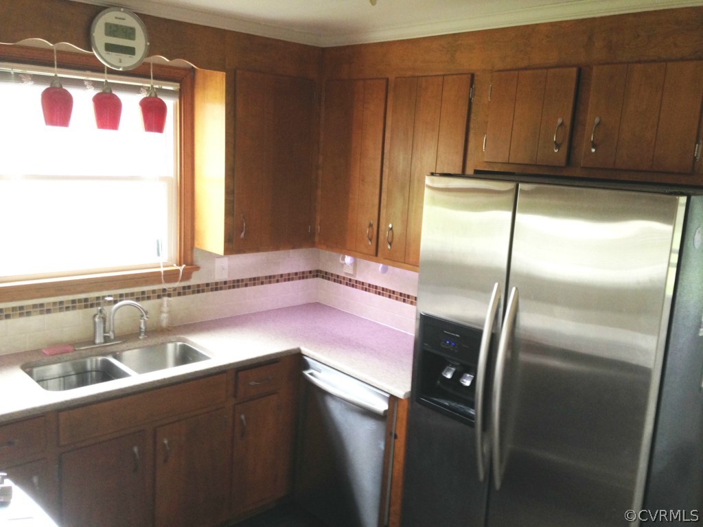 50 Arkwright Road North Chesterfield, VA 23236 - Photo 14 of 16 a kitchen with a refrigerator and a sink