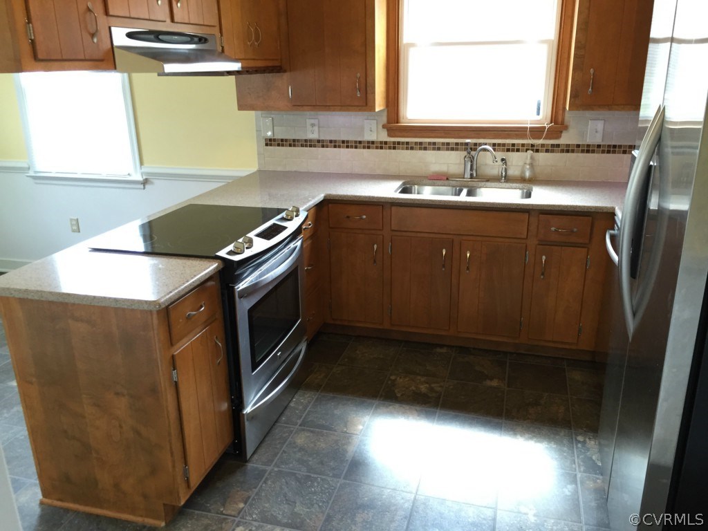 50 Arkwright Road North Chesterfield, VA 23236 - Photo 8 of 16 a kitchen with a sink and a window